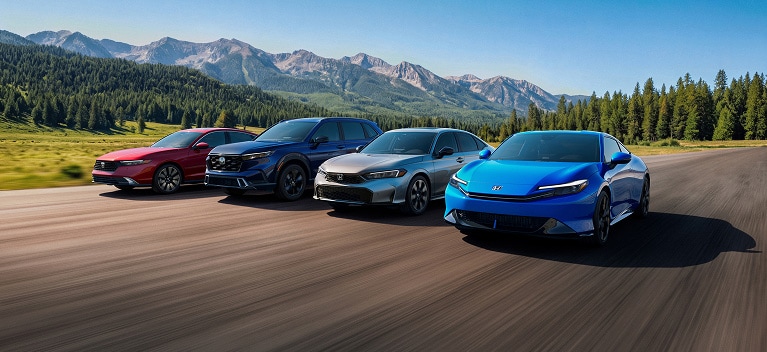 2026 Honda Hybrid models packshot, driving along a scenic mountain road with a forest backdrop. 2026 Honda Hybrid models packshot, driving along a scenic mountain road with a forest backdrop.